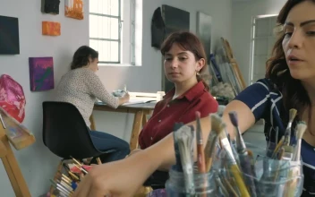 Free Video Stock three artist girls working in a painting workshop