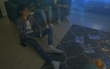 Free Video Stock three friends during a video games night