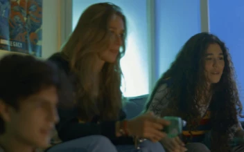 Free Video Stock three friends having fun playing video games