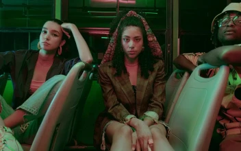 Free Video Stock three models posing to the lens while on board a
