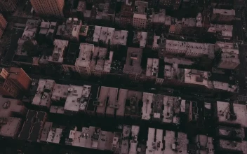 Free Video Stock tilt aerial shot of the skyline in manhattan nyc