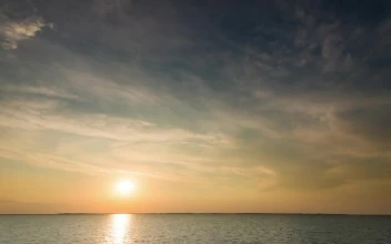 Free Video Stock time lapse of the sunrise before a storm at sea