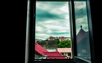Free Video Stock timelapse of swirling clouds through a window
