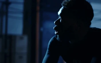 Free Video Stock tired athlete catching his breath at a gym
