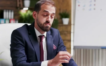 Free Video Stock tired businessman takes his face