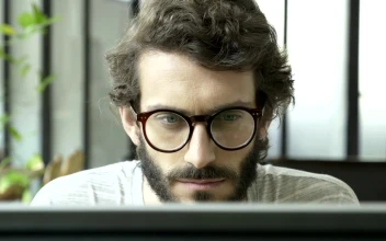Free Video Stock tired man reading at the computer rest his eyes