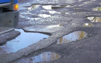 Free Video Stock tires hitting the street bumps