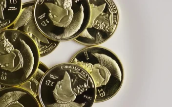 Free Video Stock titan bitcoin gold coins on a white background