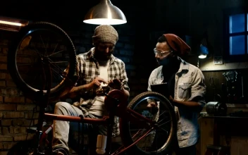 Free Video Stock to bake me mechanics laughing at the workshop