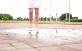 Free Video Stock toddler jumping in a puddle