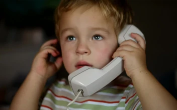 Free Video Stock toddler talking on the phone