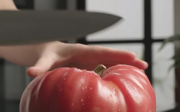 Free Video Stock tomato being prepared in a kitchen