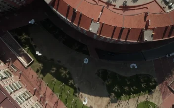 Free Video Stock top aerial shot crossing barcelona buildings