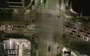 Free Video Stock top aerial shot of a vehicular crossing