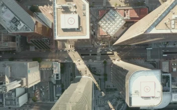 Free Video Stock top aerial shot of skyscrapers and avenues in la