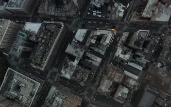 Free Video Stock top aerial shot of the rooftops of the city