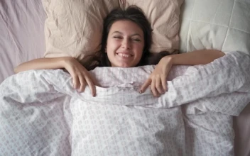Free Video Stock top shot of a woman waking up in the morning
