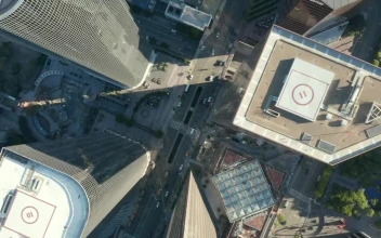 Free Video Stock top spinning aerial shot of a city buildings