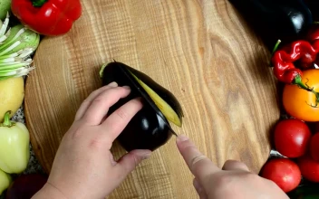 Free Video Stock top view of a person slicing vegetables