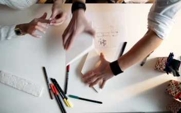 Free Video Stock top view of creative hands working on paper models and