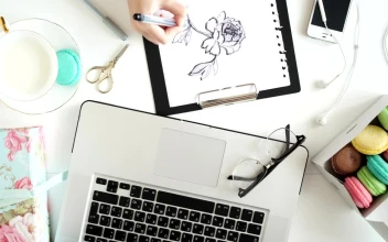 Free Video Stock top view of illustrator hand drawing on graphic tablet