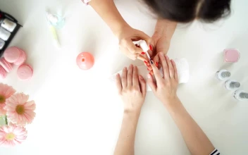 Free Video Stock top view of manicure nail painting timelapse