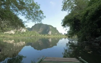 Free Video Stock tourist boat heading through ha long bay