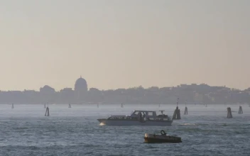 Free Video Stock tourist boat heading by venice
