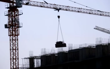 Free Video Stock tower crane silhouette on a construction site