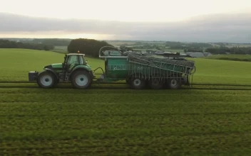 Free Video Stock tractor pulling a water tank