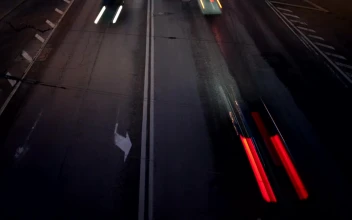 Free Video Stock traffic heading in two directions at night