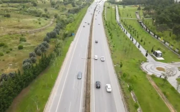 Free Video Stock traffic in a two way highway aerial view