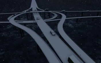 Free Video Stock traffic in the bridges over a river while snowing