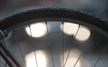 Free Video Stock traffic through a bike wheel