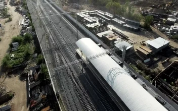 Free Video Stock train departing from a city station