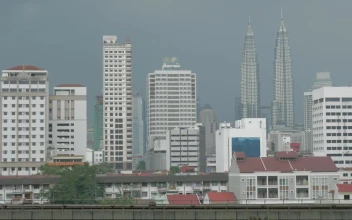 Free Video Stock train heading across the city in kuala lumpur