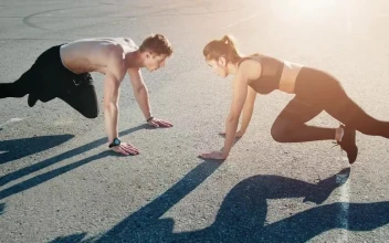 Free Video Stock trainer motivates man during outdoor workout