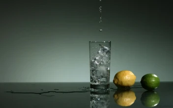 Free Stock Video Water Falling Into A Glass With Ice Cubes