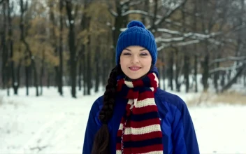 Free Stock Video Warm Woman During Winter Walking Head On In A Forest