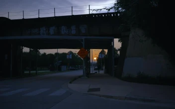 Free Stock Video Walking Through The City Under A Bridge At Sunset