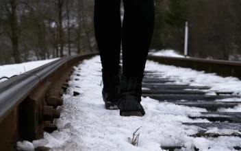 Free Stock Video Walking Over An Old Railway Tracks In The Winter