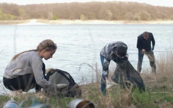 Free Stock Video Volunteers Cleaning Up Trash Next To A River