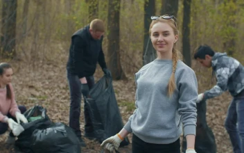 Free Stock Video Volunteer Showing The Trash She Recycles