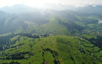 Free Stock Video Village In The Mountains Afar Aerial Shot