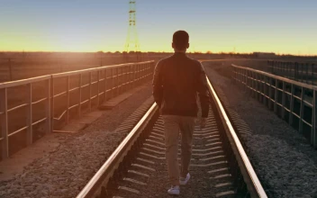Free Stock Video Urban Man Walking On The Train Tracks