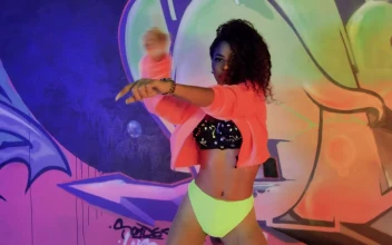 Free Stock Video Urban Girl Dancing In Front Of A Wall With Graffiti