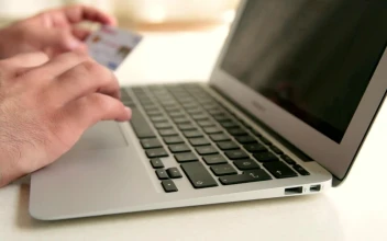 Free Stock Video Typing A Credit Card Data Into A Computer