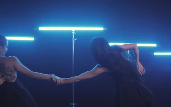Free Stock Video Two Women Dancing Illuminated With Blue Light Bars