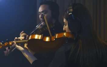 Free Stock Video Two Talented Violinists Playing In A Studio