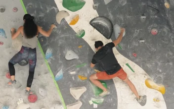 Free Stock Video Two People Practicing Mountaineering On A Wall